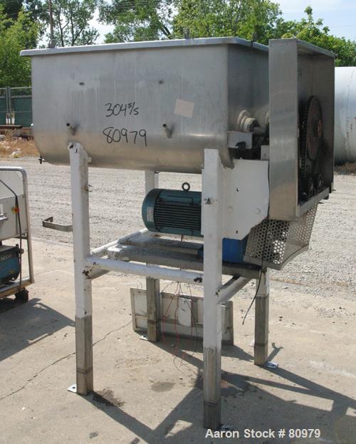 Used Twin Screw Mixer, 32 Cubic Feet, 304 Stainless Steel. Non-jacketed trough 36" wide x 48" long x 20" deep. (2) 20" diameter x 3-1/2" pitch screws. No top cover, (1) end bottom outlet. Driven by a...