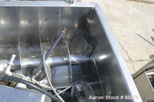 Used Twin Screw Mixer, 32 Cubic Feet, 304 Stainless Steel. Non-jacketed trough 36" wide x 48" long x 20" deep. (2) 20" diameter x 3-1/2" pitch screws. No top cover, (1) end bottom outlet. Driven by a...