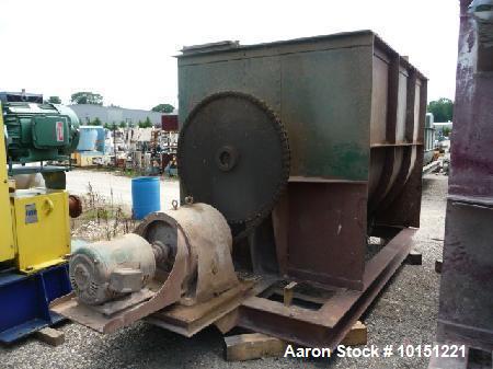 Used Double Ribbon Mixer. Approximately 360 cubic foot  driven by a 50 hp motor. Has 66" x 180" long x 67" deep chamber direct connected to right angle gear reducer from a 50 hp motor. Has non-jacket...