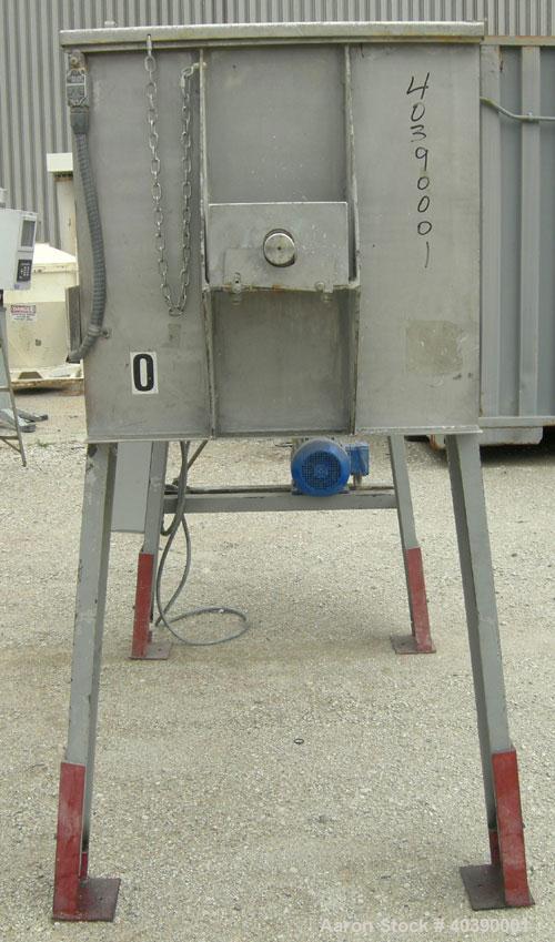 Used Double spiral ribbon blender, approximate 29 cubic feet working capacity, 304 stainless steel. Non-Jacketed trough 72" long x 28" wide x approximately 31" deep.  2 1/2" diameter shaft,  inner ri...