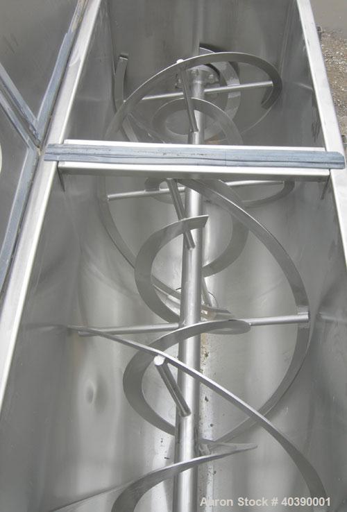 Used Double spiral ribbon blender, approximate 29 cubic feet working capacity, 304 stainless steel. Non-Jacketed trough 72" long x 28" wide x approximately 31" deep.  2 1/2" diameter shaft,  inner ri...