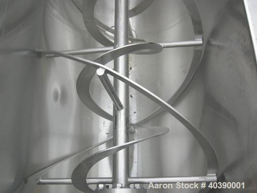 Used Double spiral ribbon blender, approximate 29 cubic feet working capacity, 304 stainless steel. Non-Jacketed trough 72" long x 28" wide x approximately 31" deep.  2 1/2" diameter shaft,  inner ri...