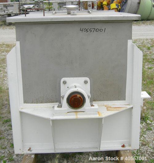 Used Double Spiral Ribbon Blender, 64 cubic feet working capacity, 304 stainless steel. Non-jacketed trough 36" wide x 96" long x approximately 41" deep. 5 1/2" diameter shaft, inner ribbon 2" wide x...