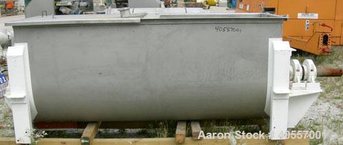 Used Double Spiral Ribbon Blender, 64 cubic feet working capacity, 304 stainless steel. Non-jacketed trough 36" wide x 96" long x approximately 41" deep. 5 1/2" diameter shaft, inner ribbon 2" wide x...