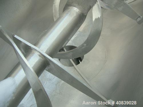 Used:  Aaron Process Double Spiral Ribbon Blender, 24 Cubic Foot Working Capacity, 316 Stainless Steel.  Non-jacketed trough 26" wide x 66" long x approximately 30" deep.  3 1/2" diameter shaft, inne...