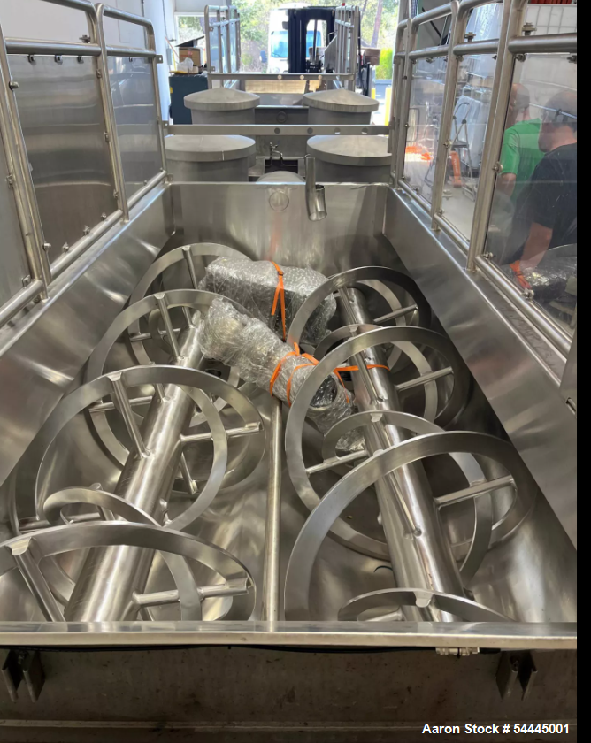 Used Approximately 140 cuft / 1100 Gallon capacity Dual Shaft Ribbon Blender. Stainless steel. Dimple Jacket. Bottom Discharge: (2) 10" ports, one for each screw, Trough dimensions: Length: 119 inche...