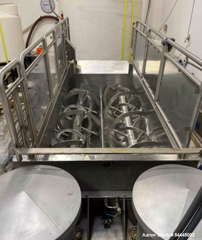 Used Approximately 140 cuft / 1100 Gallon capacity Dual Shaft Ribbon Blender. Stainless steel. Dimple Jacket. Bottom Discharge: (2) 10" ports, one for each screw, Trough dimensions: Length: 119 inche...