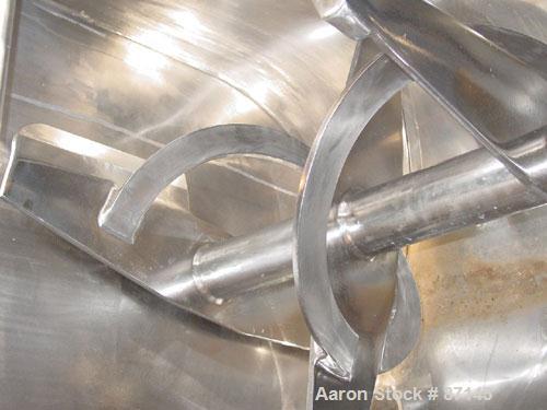 Used Double Spiral Ribbon Blender, 36 cubic feet working capacity, stainless steel. Non-jacketed trough 30" wide x 78" long x approximately 36" deep. 3-1/2" diameter shaft, inner ribbon 2" wide x 3/8...