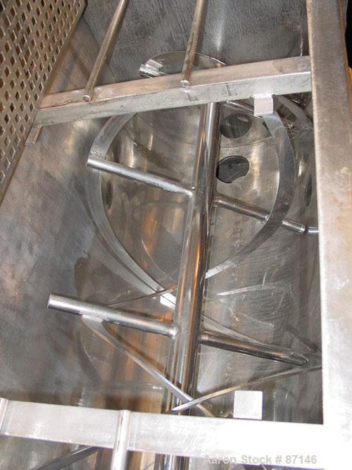 USED: Double spiral ribbon blender, 36 cubic feet working capacity, stainless steel. Non-jacketed trough 30" wide x 78" long x approximately 36" deep. 3" diameter shaft, inner ribbon 2" wide x 1/4" t...
