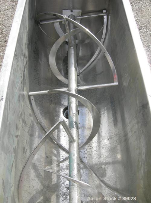 USED: Ribbon Blender, 23 cubic feet working capacity, 304 stainless steel. Dimple jacketed trough 26" wide x 66" long x approximately 28" deep, no rating. 2-1/2" diameter shaft, inner ribbon 2" wide ...