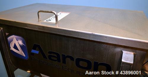 Used Aaron Process IMB-15 Ribbon Blender, 15 cubic feet capacity. Constructed of stainless steel material on all product contact areas, all external stiffeners, legs, ribs and supports. Inside trough...