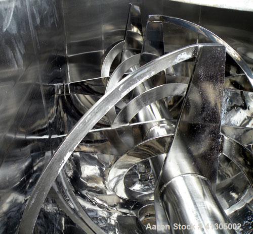 Used Aaron Process Double Spiral Ribbon Blender, 100 cubic feet working capacity (116 total), Model NR100, 304 Stainless Steel. Dimple jacketed trough 48" wide x 96" long x approx 54" deep. 8" diamet...