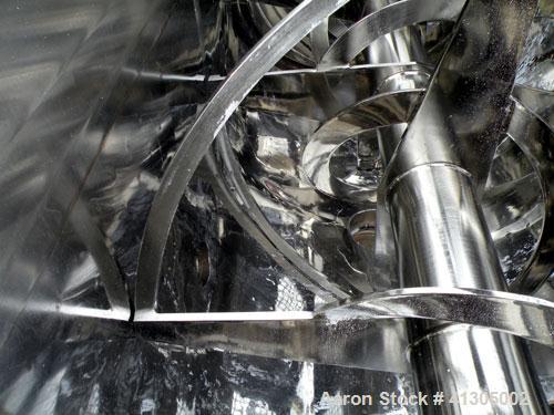 Used Aaron Process Double Spiral Ribbon Blender, 100 cubic feet working capacity (116 total), Model NR100, 304 Stainless Steel. Dimple jacketed trough 48" wide x 96" long x approx 54" deep. 8" diamet...