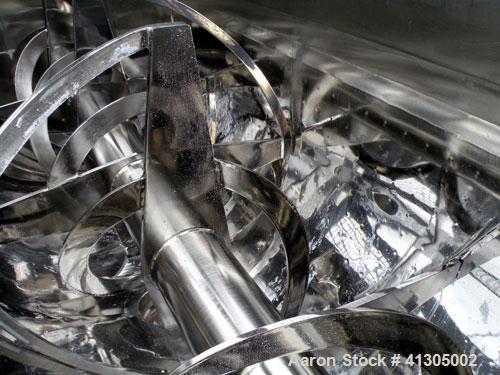 Used Aaron Process Double Spiral Ribbon Blender, 100 cubic feet working capacity (116 total), Model NR100, 304 Stainless Steel. Dimple jacketed trough 48" wide x 96" long x approx 54" deep. 8" diamet...