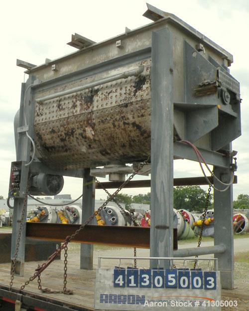 Used Aaron Process Double Spiral Ribbon Blender, 100 cubic feet working capacity (116 total), model NR100, 304 stainless steel. Dimple jacketed trough 48" wide x 96" long x approximately 54" deep. 8"...
