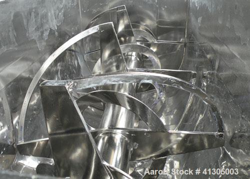 Used Aaron Process Double Spiral Ribbon Blender, 100 cubic feet working capacity (116 total), model NR100, 304 stainless steel. Dimple jacketed trough 48" wide x 96" long x approximately 54" deep. 8"...