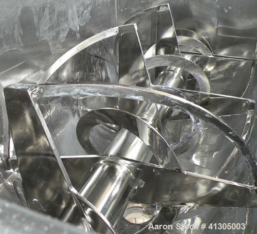 Used Aaron Process Double Spiral Ribbon Blender, 100 cubic feet working capacity (116 total), model NR100, 304 stainless steel. Dimple jacketed trough 48" wide x 96" long x approximately 54" deep. 8"...