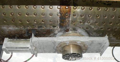 Used Aaron Process Double Spiral Ribbon Blender, 100 cubic feet working capacity (116 total), model NR100, 304 stainless steel. Dimple jacketed trough 48" wide x 96" long x approximately 54" deep. 8"...