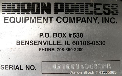 Used Aaron Process Double Spiral Ribbon Blender, 100 cubic feet working capacity (116 total), model NR100, 304 stainless steel. Dimple jacketed trough 48" wide x 96" long x approximately 54" deep. 8"...