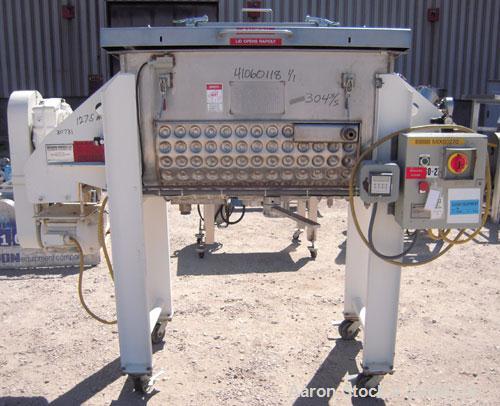 Used Aaron Process Double Spiral Ribbon Blender, 14 Cubic Feet Working Capacity, 304 Stainless Steel. Dimple jacketed trough 24" wide x 48" long  x approximately 27 1/2" deep, rated 100 psi at 350 de...