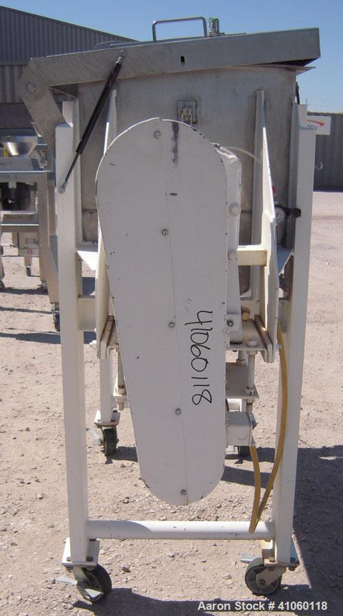 Used Aaron Process Double Spiral Ribbon Blender, 14 Cubic Feet Working Capacity, 304 Stainless Steel. Dimple jacketed trough 24" wide x 48" long  x approximately 27 1/2" deep, rated 100 psi at 350 de...