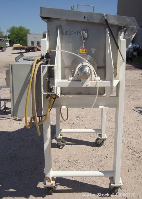 Used Aaron Process Double Spiral Ribbon Blender, 14 Cubic Feet Working Capacity, 304 Stainless Steel. Dimple jacketed trough 24" wide x 48" long  x approximately 27 1/2" deep, rated 100 psi at 350 de...