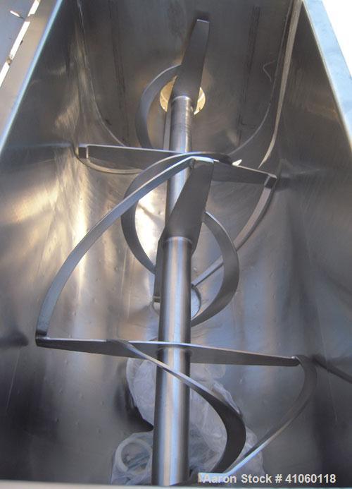 Used Aaron Process Double Spiral Ribbon Blender, 14 Cubic Feet Working Capacity, 304 Stainless Steel. Dimple jacketed trough 24" wide x 48" long  x approximately 27 1/2" deep, rated 100 psi at 350 de...
