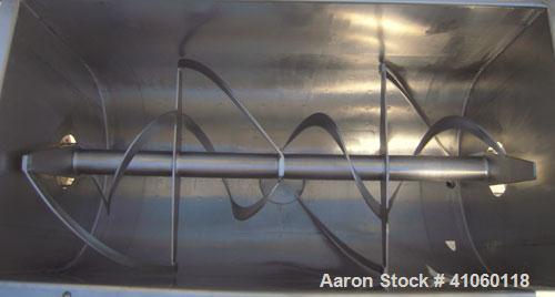 Used Aaron Process Double Spiral Ribbon Blender, 14 Cubic Feet Working Capacity, 304 Stainless Steel. Dimple jacketed trough 24" wide x 48" long  x approximately 27 1/2" deep, rated 100 psi at 350 de...