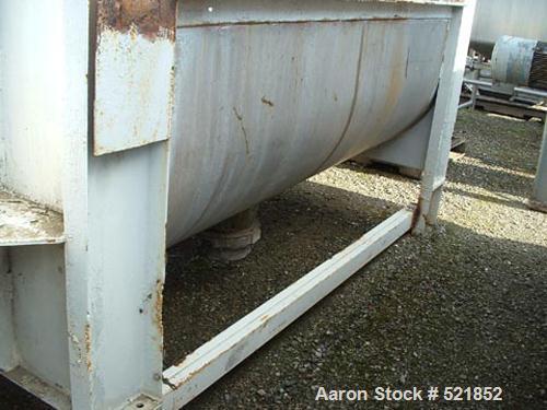 USED: Aaron stainless steel single shaft double ribbon blender, 80cu ft capacity. 40" wide x 8' long, 1/2" x 2" inner and outer ribbons,safety grate and covers, 10" diameter center bottom outlet with...