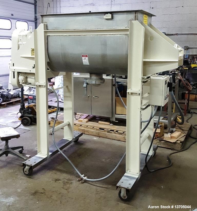 Used Aaron Double Ribbon Blender. Stainless steel, 14 cubic foot working capacity. Double ribbon blender, stainless steel construction. 24" wide x 48" long, 6" diameter center bottom discharge with v...