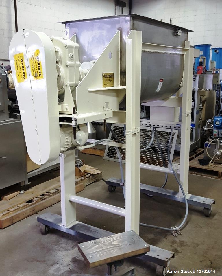 Used Aaron Double Ribbon Blender. Stainless steel, 14 cubic foot working capacity. Double ribbon blender, stainless steel construction. 24" wide x 48" long, 6" diameter center bottom discharge with v...