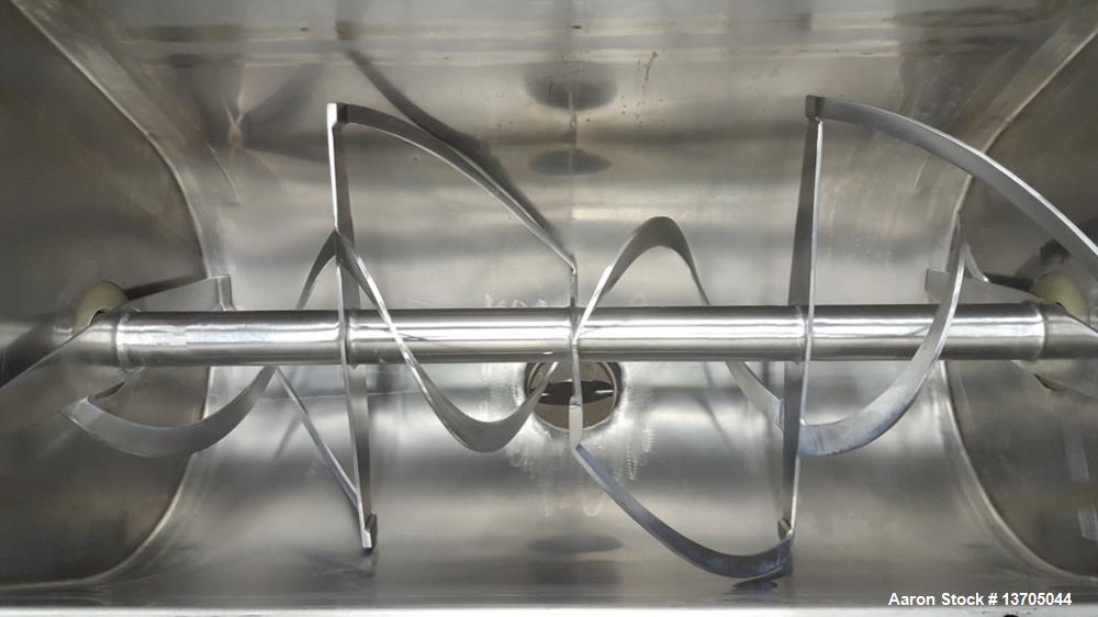 Used Aaron Double Ribbon Blender. Stainless steel, 14 cubic foot working capacity. Double ribbon blender, stainless steel construction. 24" wide x 48" long, 6" diameter center bottom discharge with v...