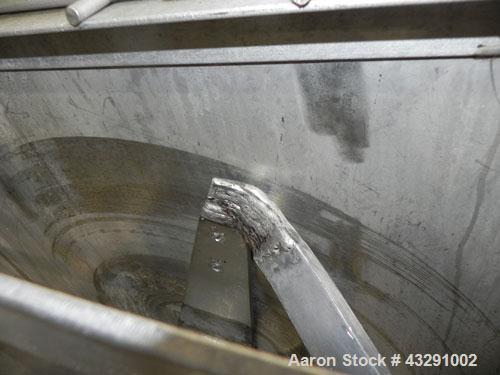 Used Aaron Process Equipment Ribbon Blender, 80 Cubic Feet, 304 Stainless Steel. Trough 40" wide x 96" long x approximate 48" deep, dimple jacketed on bottom only, rated 50 psi. 5" Diameter shaft, in...