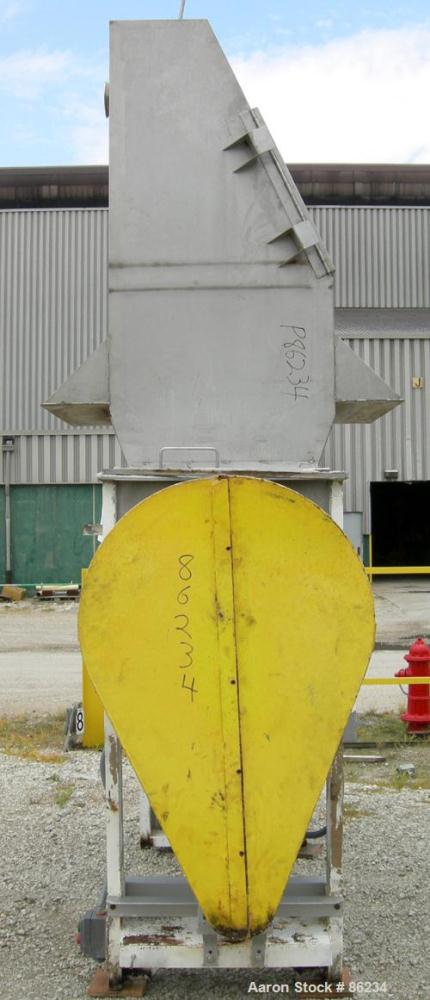 USED: Aaron double spiral ribbon blender, 36 cubic feet working capacity, 304 stainless steel. Non-jacketed trough 30" wide x 77" long x approximately 33" deep. 2-3/4" diameter shaft, inner ribbon 1-...