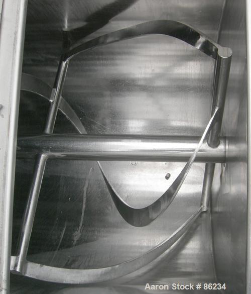 USED: Aaron double spiral ribbon blender, 36 cubic feet working capacity, 304 stainless steel. Non-jacketed trough 30" wide x 77" long x approximately 33" deep. 2-3/4" diameter shaft, inner ribbon 1-...