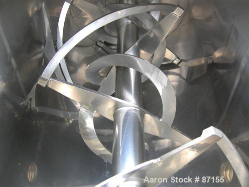 USED: Aaron Process double spiral ribbon blender, 80 cubic feet working capacity, 304 stainless steel. Non-jacketed trough 40" wide x 96" long x approximately 48" deep. 6" diameter shaft. Inner ribbo...