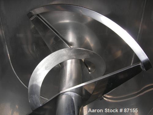 USED: Aaron Process double spiral ribbon blender, 80 cubic feet working capacity, 304 stainless steel. Non-jacketed trough 40" wide x 96" long x approximately 48" deep. 6" diameter shaft. Inner ribbo...