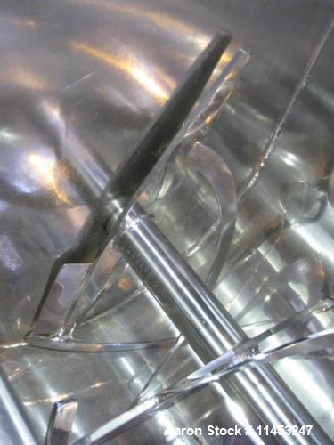 Used American Process Double Spiral Ribbon Blender. Model DRB-155. Approximate 155 Cubic Foot Working Capacity, Stainless Steel. Non-jacketed trough measures 120" long x 50" wide x 59" deep. 10" cent...