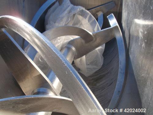 Used American Process Double Spiral Ribbon Blender, model DRB-66XH, 66 cubic feet working capacity, 304 stainless steel. Non-jacketed trough 37" wide x 96" long. (3) 8’’ diameter center bottom outlet...