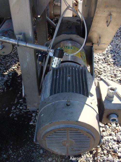 Used American Process Double Spiral Ribbon Blender, model DRB-66XH, 66 cubic feet working capacity, 304 stainless steel. Non-jacketed trough 37" wide x 96" long. (3) 8’’ diameter center bottom outlet...