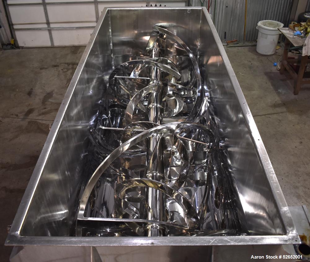 Used American Process Double Spiral Ribbon Blender, Model DRB120, 120 Cubic Feet, Stainless Steel. Non-jacketed trough approximate 44"W x 120"L x 54" Deep. 6" diameter shaft, approximately 40" diamet...