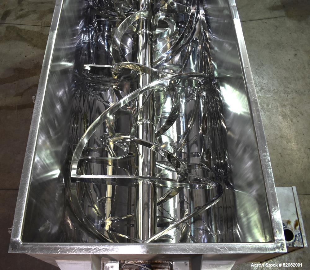 Used American Process Double Spiral Ribbon Blender, Model DRB120, 120 Cubic Feet, Stainless Steel. Non-jacketed trough approximate 44"W x 120"L x 54" Deep. 6" diameter shaft, approximately 40" diamet...