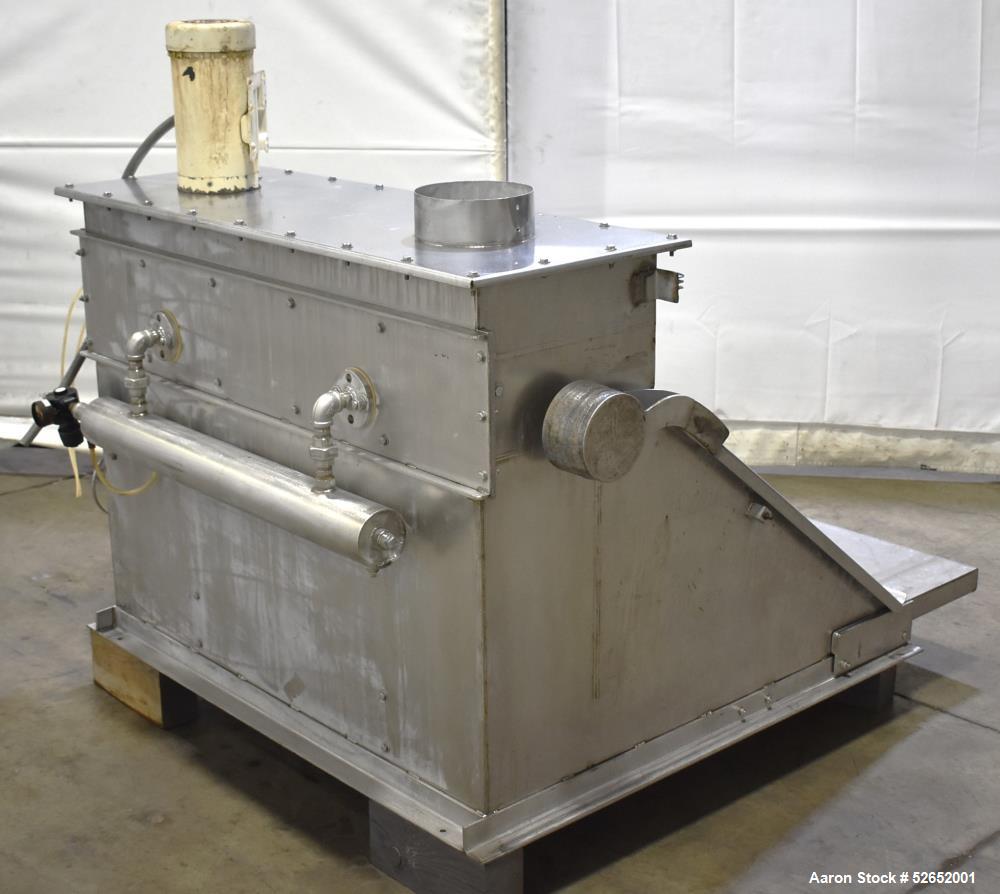 Used American Process Double Spiral Ribbon Blender, Model DRB120, 120 Cubic Feet, Stainless Steel. Non-jacketed trough approximate 44"W x 120"L x 54" Deep. 6" diameter shaft, approximately 40" diamet...