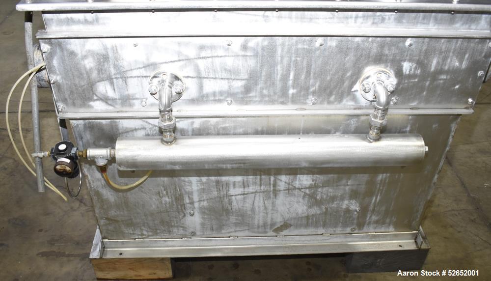 Used American Process Double Spiral Ribbon Blender, Model DRB120, 120 Cubic Feet, Stainless Steel. Non-jacketed trough approximate 44"W x 120"L x 54" Deep. 6" diameter shaft, approximately 40" diamet...