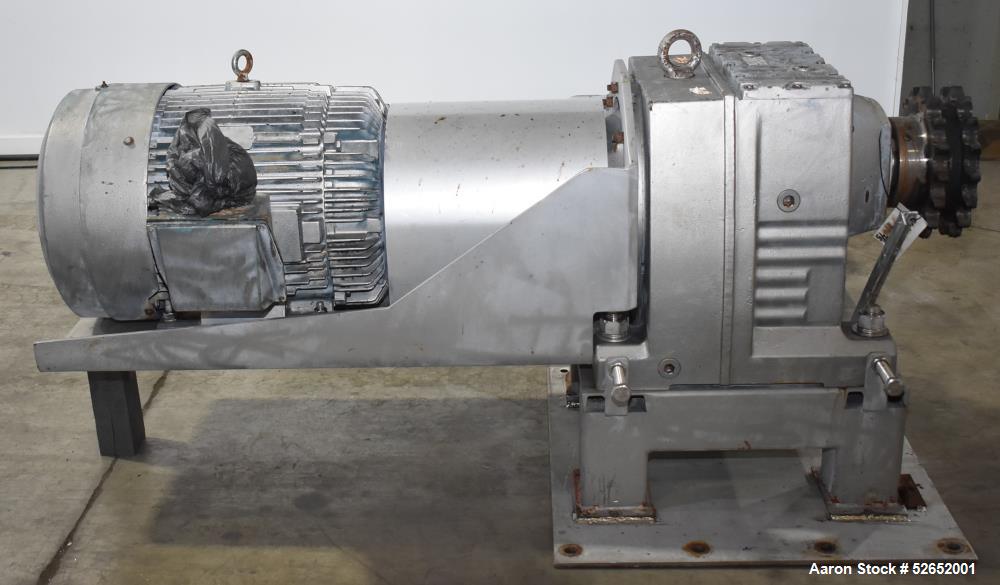 Used American Process Double Spiral Ribbon Blender, Model DRB120, 120 Cubic Feet, Stainless Steel. Non-jacketed trough approximate 44"W x 120"L x 54" Deep. 6" diameter shaft, approximately 40" diamet...