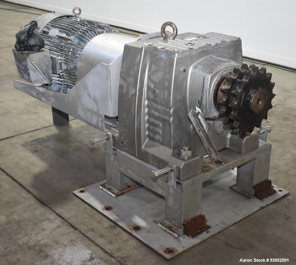 Used American Process Double Spiral Ribbon Blender, Model DRB120, 120 Cubic Feet, Stainless Steel. Non-jacketed trough approximate 44"W x 120"L x 54" Deep. 6" diameter shaft, approximately 40" diamet...
