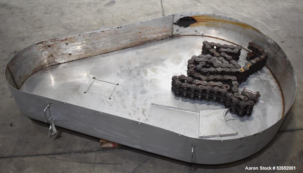 Used American Process Double Spiral Ribbon Blender, Model DRB120, 120 Cubic Feet, Stainless Steel. Non-jacketed trough approximate 44"W x 120"L x 54" Deep. 6" diameter shaft, approximately 40" diamet...