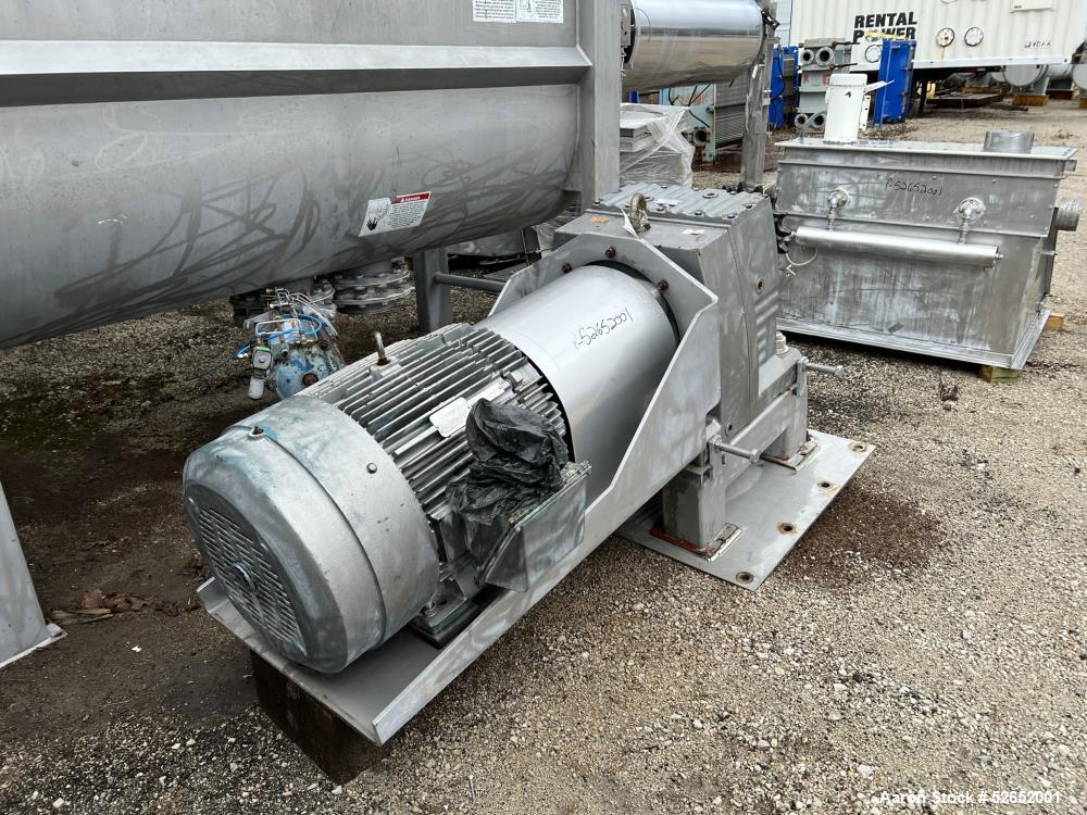 Used American Process Double Spiral Ribbon Blender, Model DRB120, 120 Cubic Feet, Stainless Steel. Non-jacketed trough approximate 44"W x 120"L x 54" Deep. 6" diameter shaft, approximately 40" diamet...