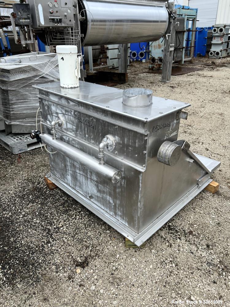Used American Process Double Spiral Ribbon Blender, Model DRB120, 120 Cubic Feet, Stainless Steel. Non-jacketed trough approximate 44"W x 120"L x 54" Deep. 6" diameter shaft, approximately 40" diamet...