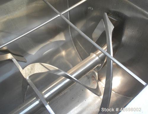 Used American Process Double Spiral Ribbon Blender, Model DRB24, 24 Cubic Feet Working Capacity, 301 Stainless Steel. Non-jacketed trough 26" wide x 66" long x approximately 29" deep. 3" Diameter sha...